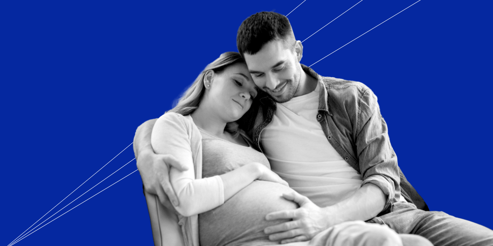 Man hugging his pregnant wife