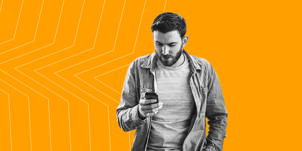 Man scrolling on his smartphone