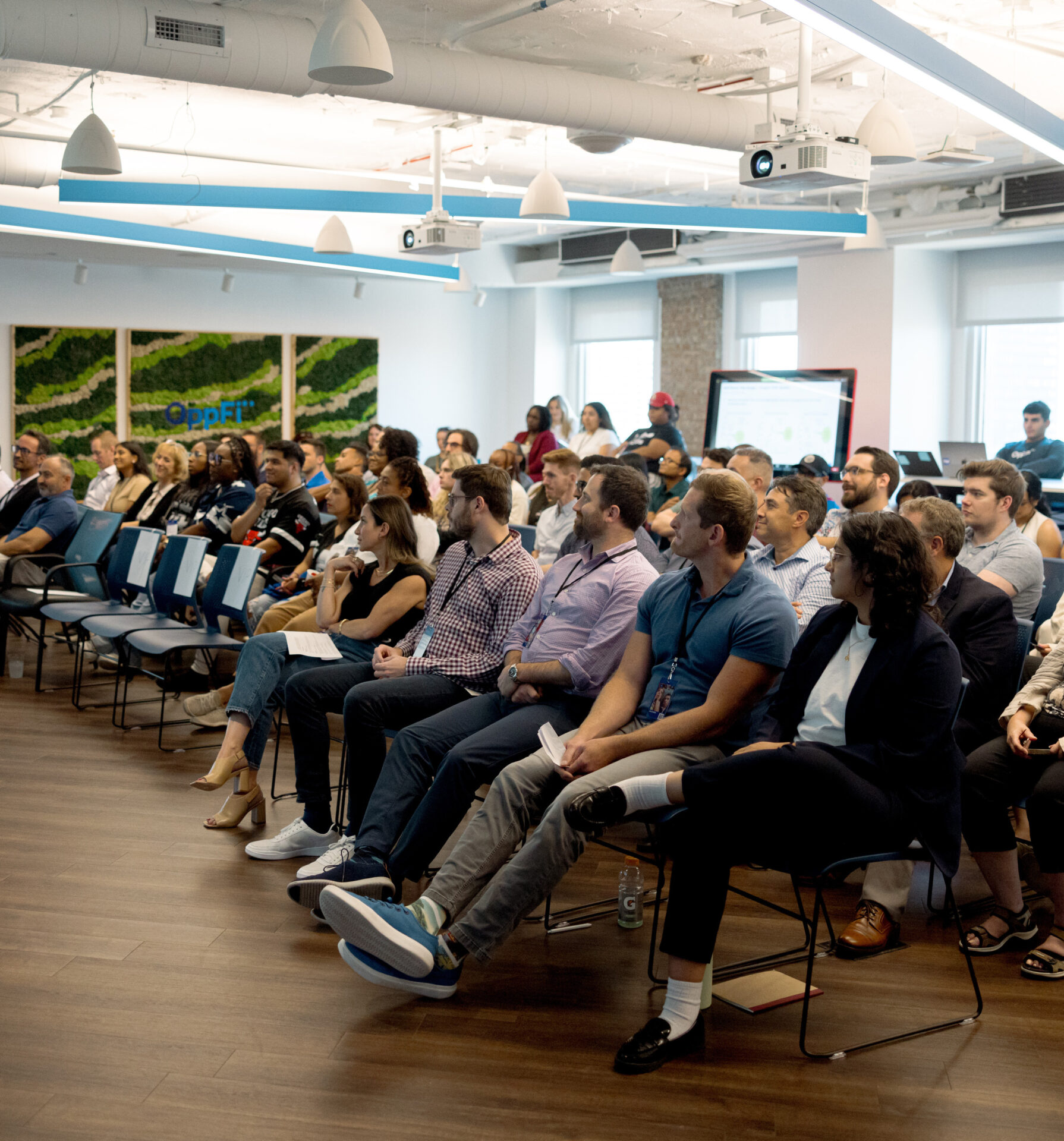 OppFi employees in town hall meeting