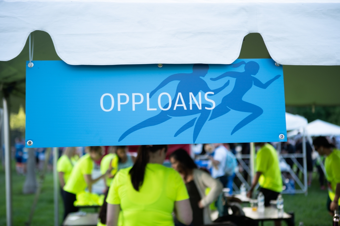 Hodari Lending (Mortgage & Loans) sign at outdoor event
